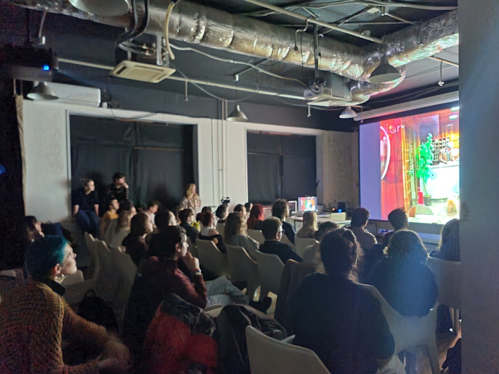 Audience watching an art film